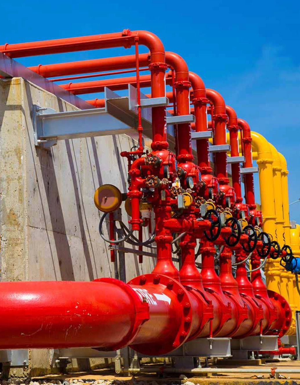 Red firefighting pipework on a plant